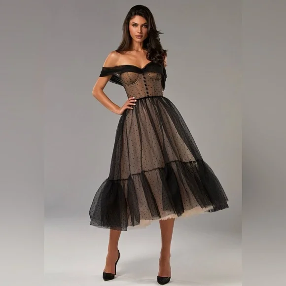 Brand: Milla
Black Polka dot midi tulle dress - Picture 2 of 4